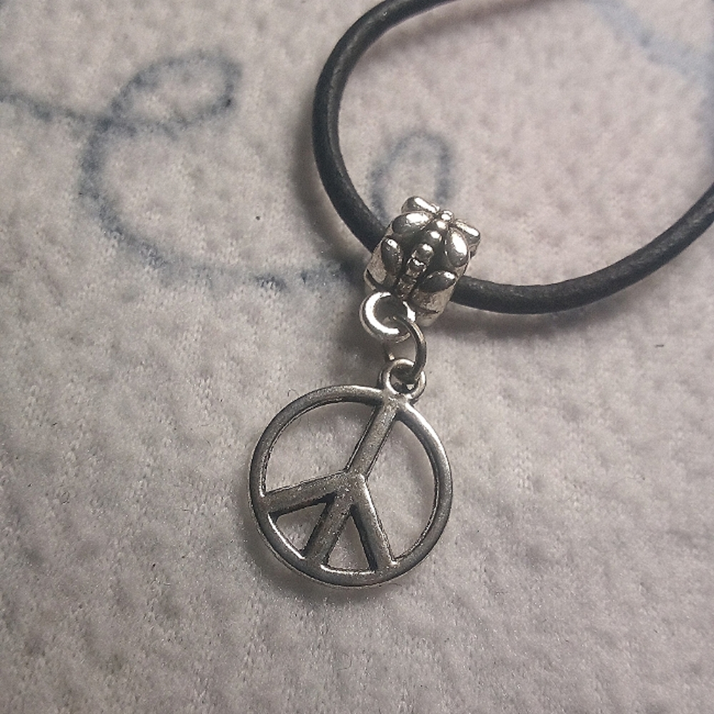 Hippy style necklace with peace sign charm